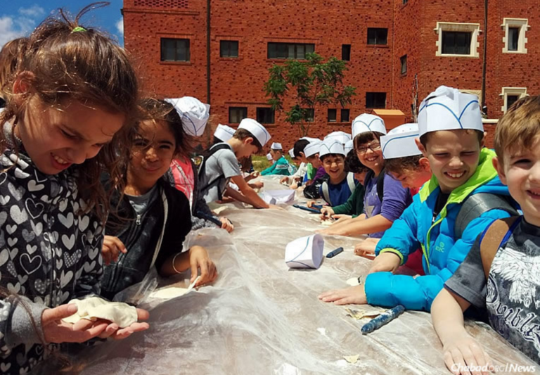 Israeli Kids Try Their Hand at One of the Busiest Matzah Bakeries in the World