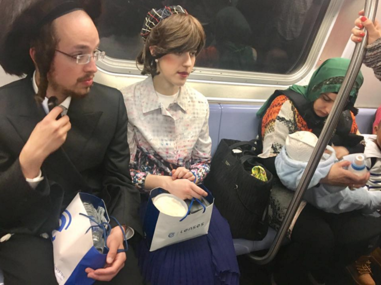 Photo of Hasidic Couple Sitting Next to Muslim Woman on Train Goes Viral