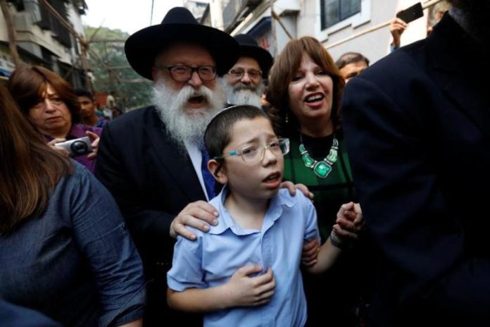 Moshe Holtzberg Returns to Mumbai, Where He Was Orphaned in Chabad House Terror Attack