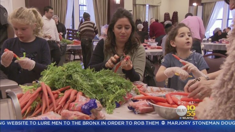 WATCH: Jewish volunteers prepare food for the needy before Purim