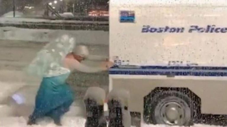 WATCH: ‘Elsa’ from Frozen helps push out a van stuck in the snow